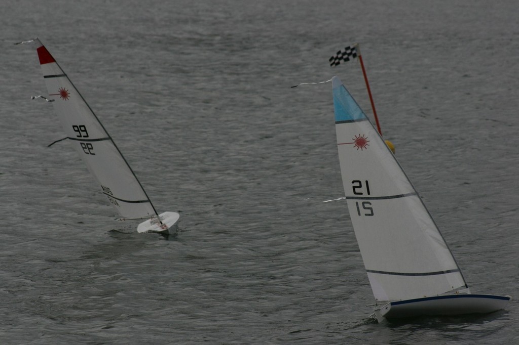 Dave Padden (99), last year’s champion and sixth this year couldn’t get a break on Paul Derwent (21) who was runner up last year and champion this year - 2009 RC Laser NSW State Championship © Cliff Bromiley